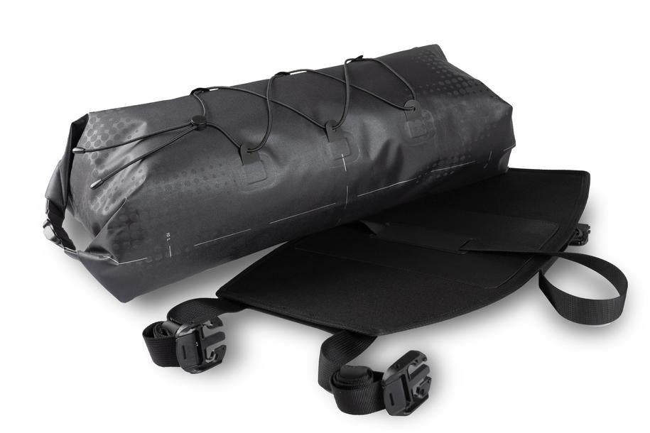 Die ACID Lenkertasche PACK PRO 15 schwarz ist eine wasserdichte Lenkertasche mit verstellbaren Riemen, Bungee-Kordeln und abnehmbarem Tragegurt für den sicheren Transport der Ausrüstung - perfekt für Radtouren rund um Goslar.
