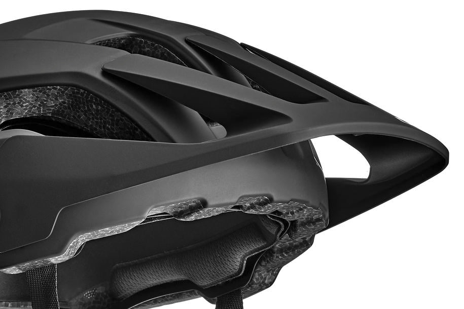 Nahaufnahme des Cube CUBE Helm FRISK MTB Trail Helm in Schwarz mit MIPS-Technologie, strukturierter Innenpolsterung, Belüftungslöchern und einem robusten Visier auf weißem Hintergrund.